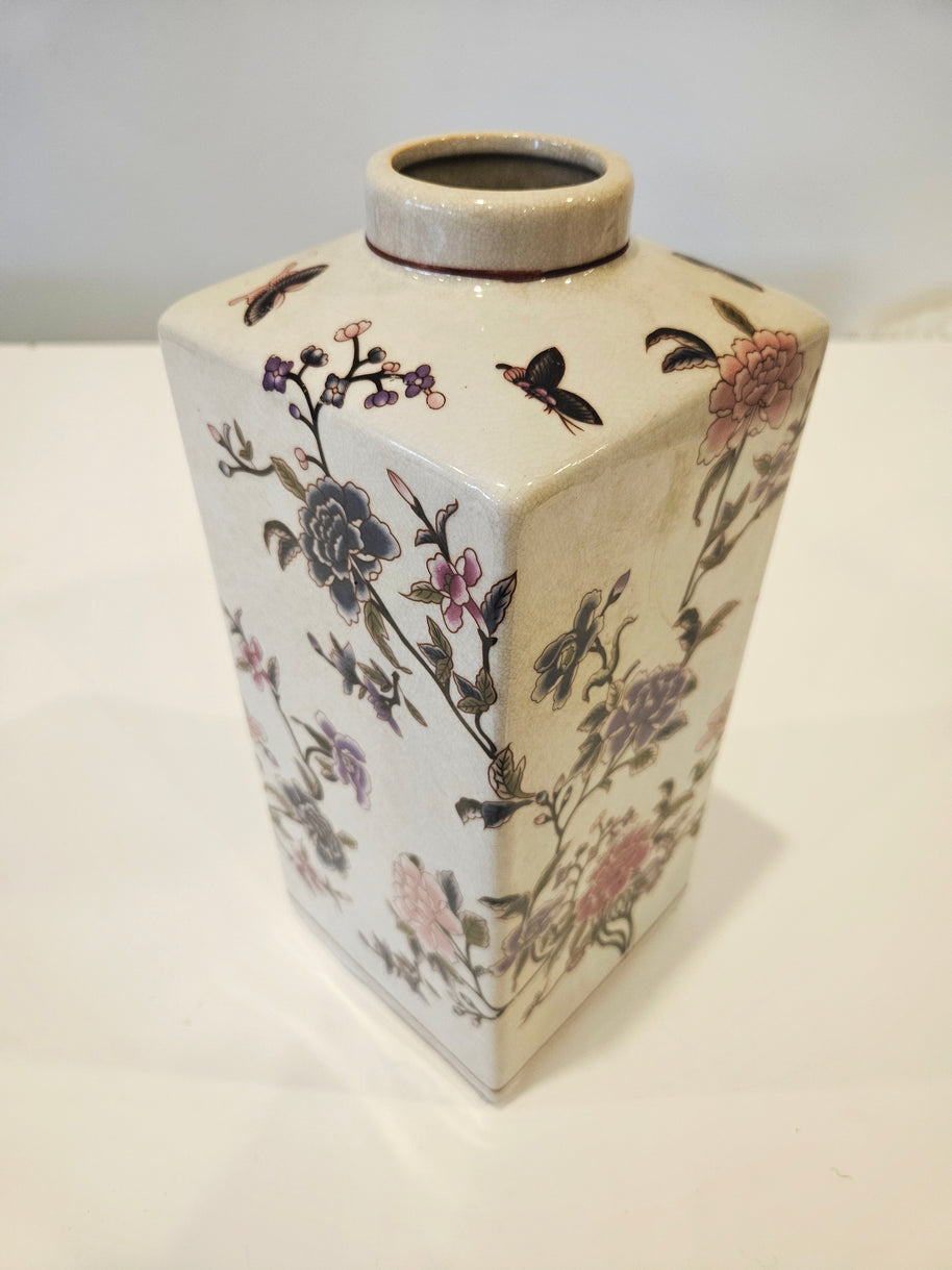 Vintage flower and butterfly art vase arrangement