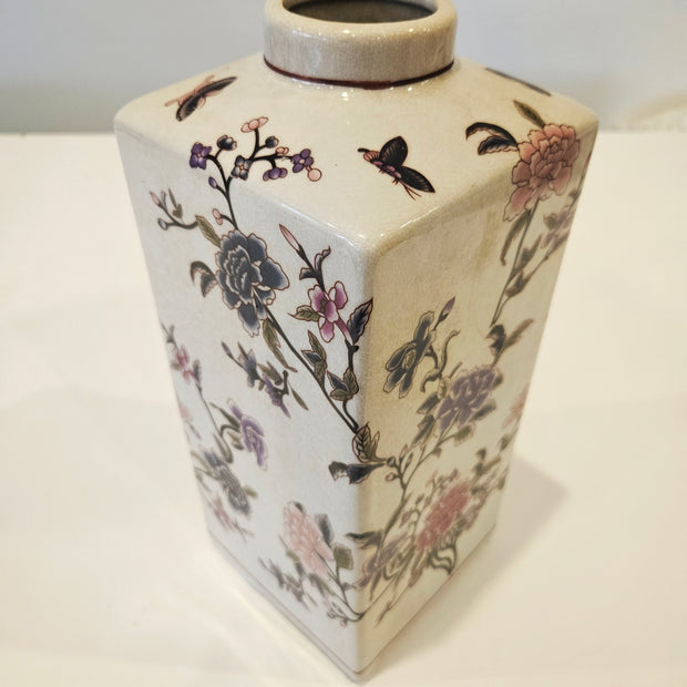 Vintage flower and butterfly art vase arrangement