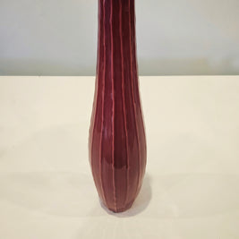 Tall red striped vase arrangement