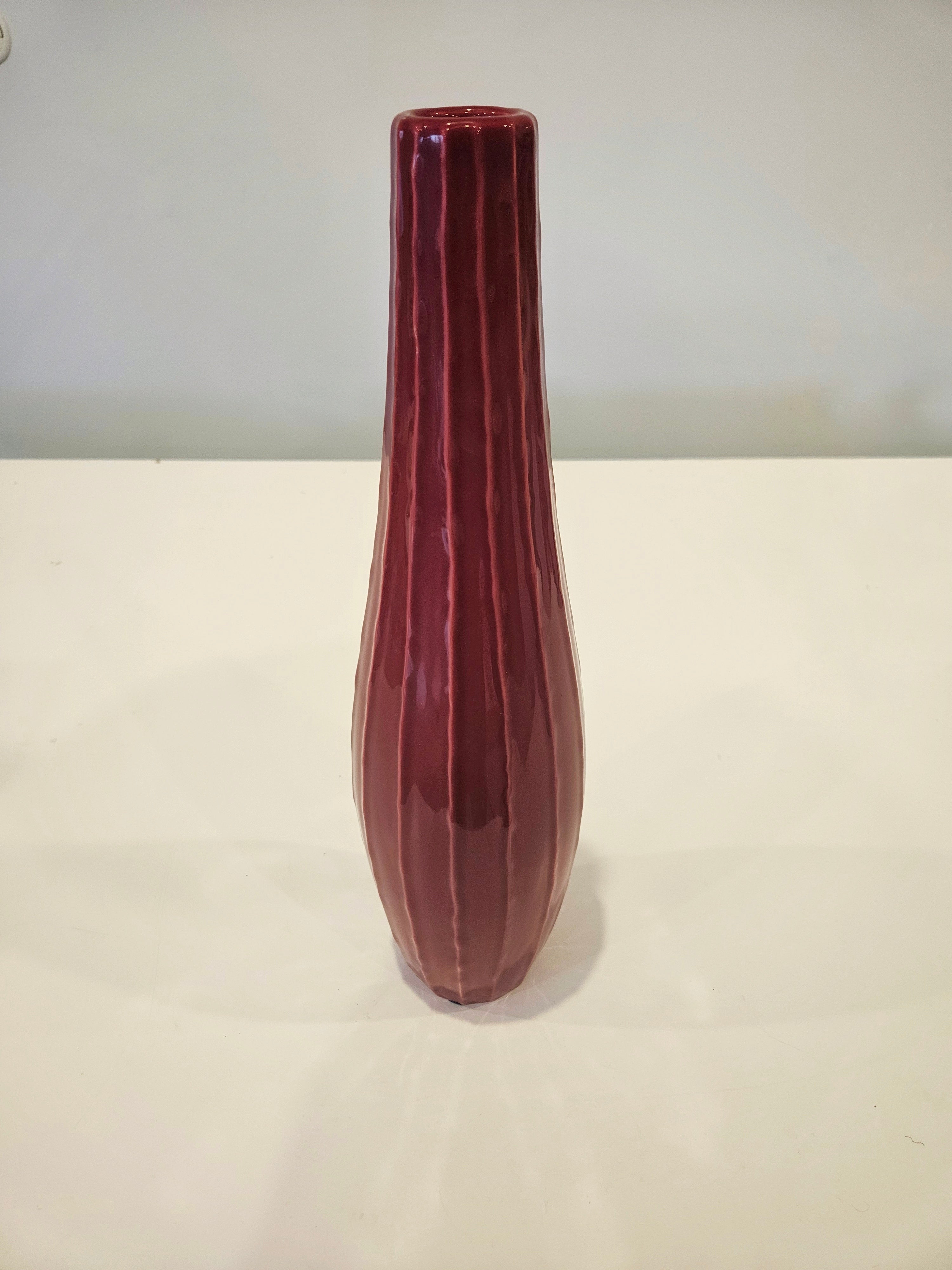 Tall red striped vase arrangement