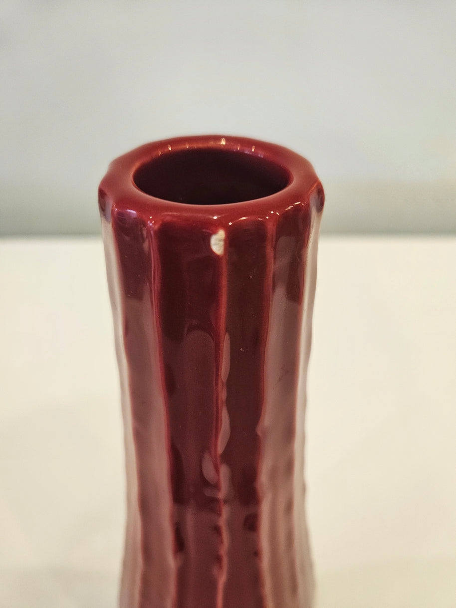 Tall red striped vase arrangement