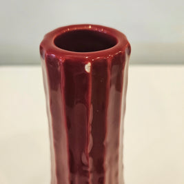 Tall red striped vase arrangement