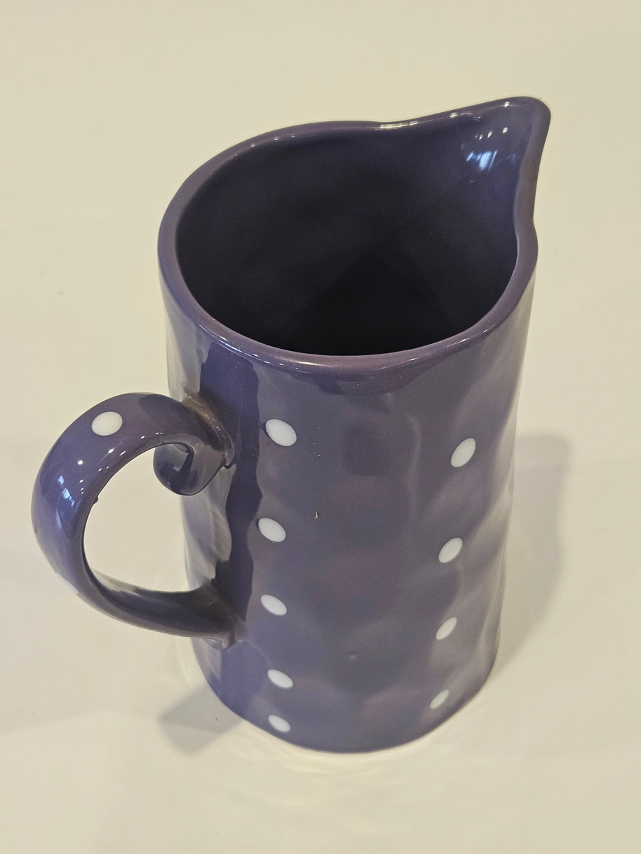 Purple polkadot pitcher vase arrangement