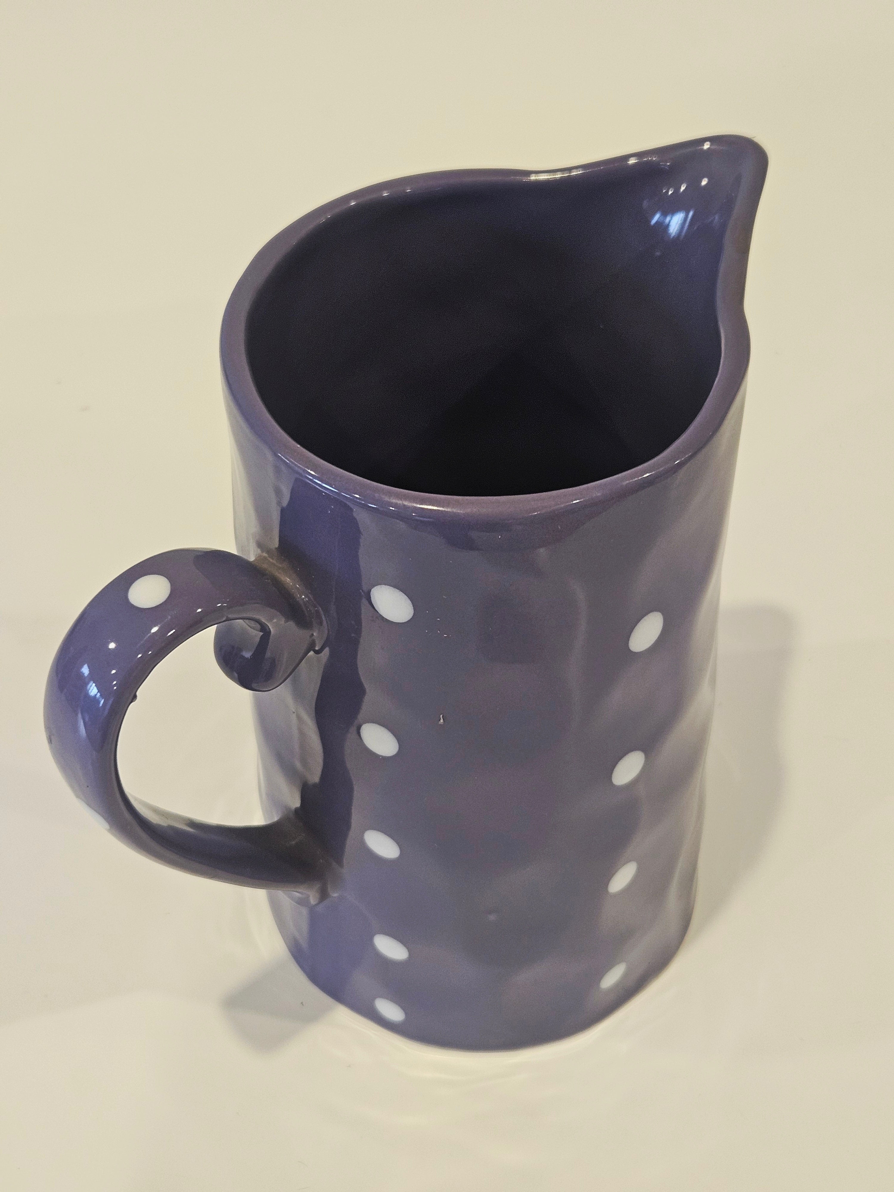 Purple polkadot pitcher vase arrangement