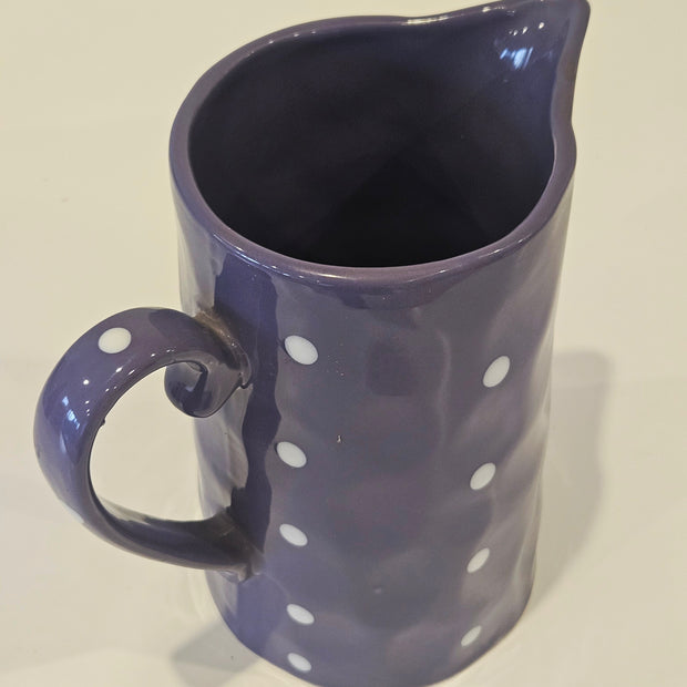 Purple polkadot pitcher vase arrangement