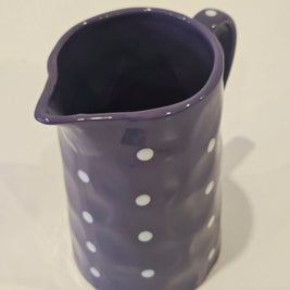 Purple polkadot pitcher vase arrangement