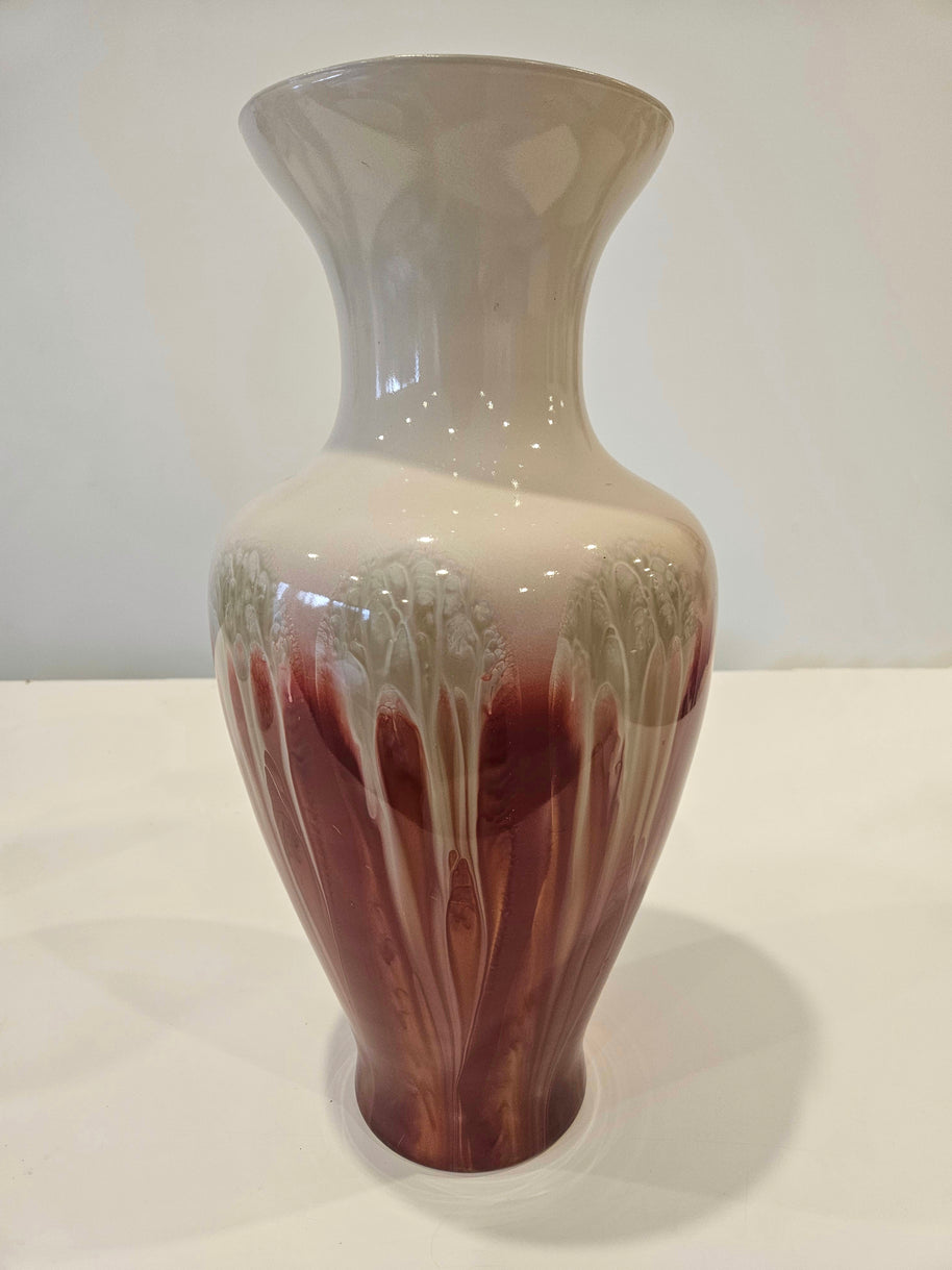 Tall red and white drip art vase arrangement