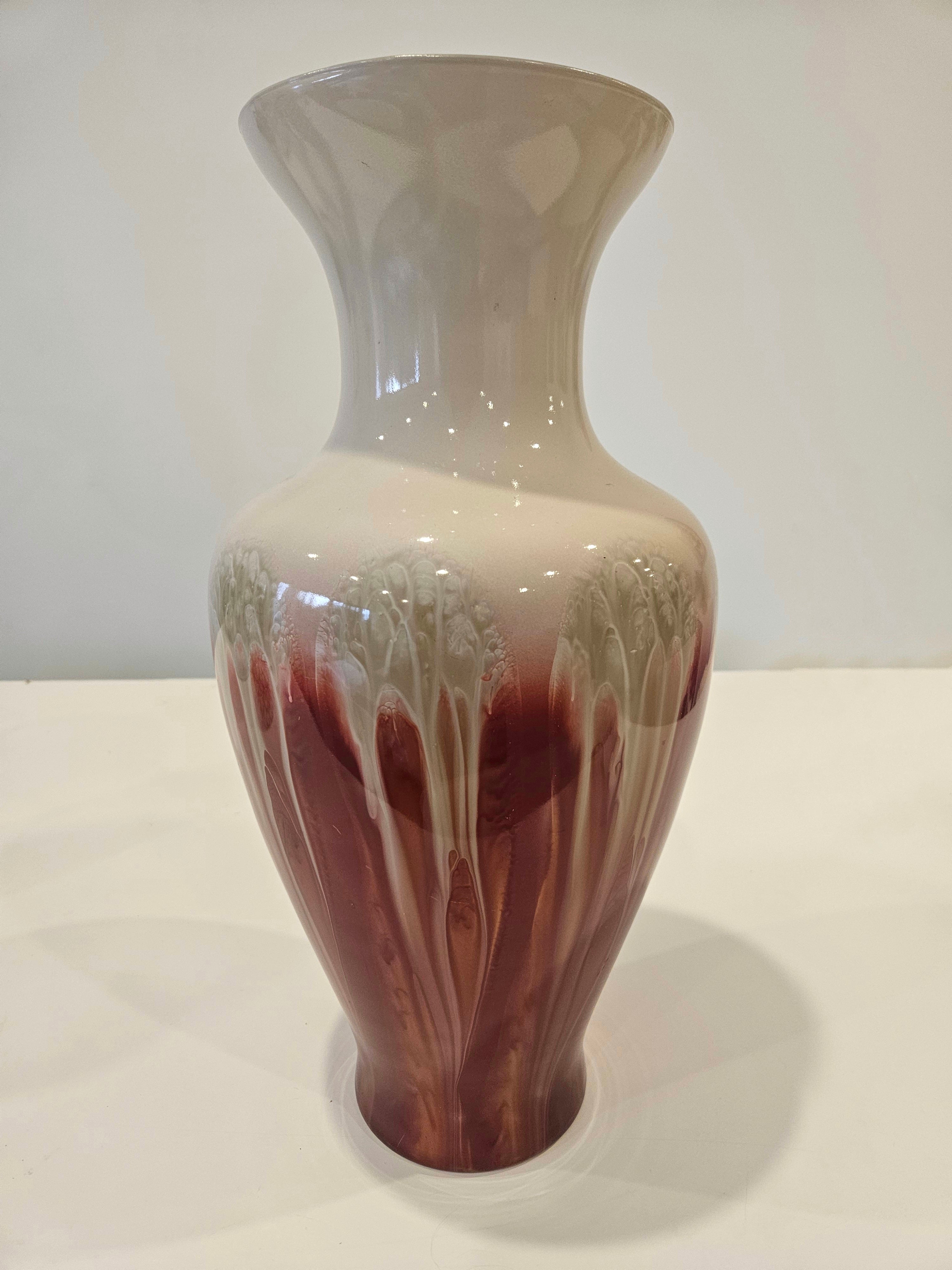Tall red and white drip art vase arrangement