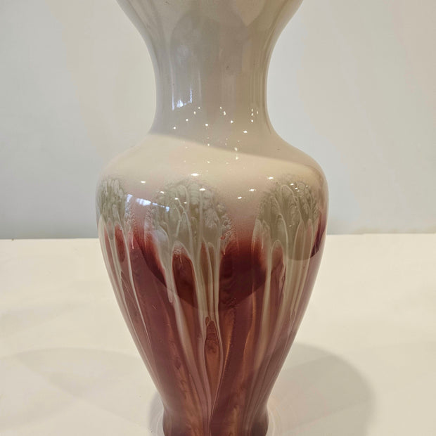 Tall red and white drip art vase arrangement