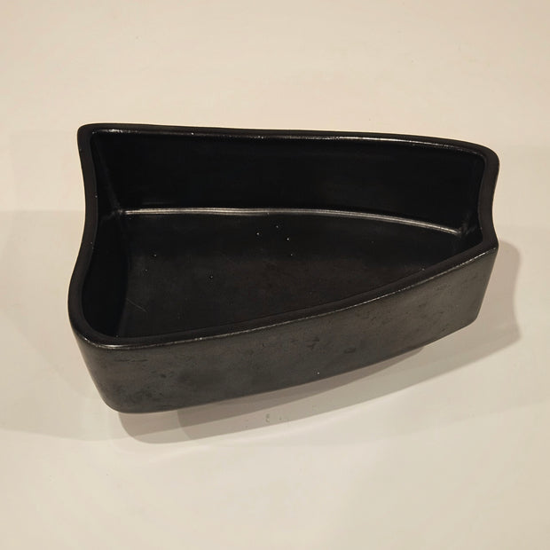 Black ikebana-inspired vase arrangement