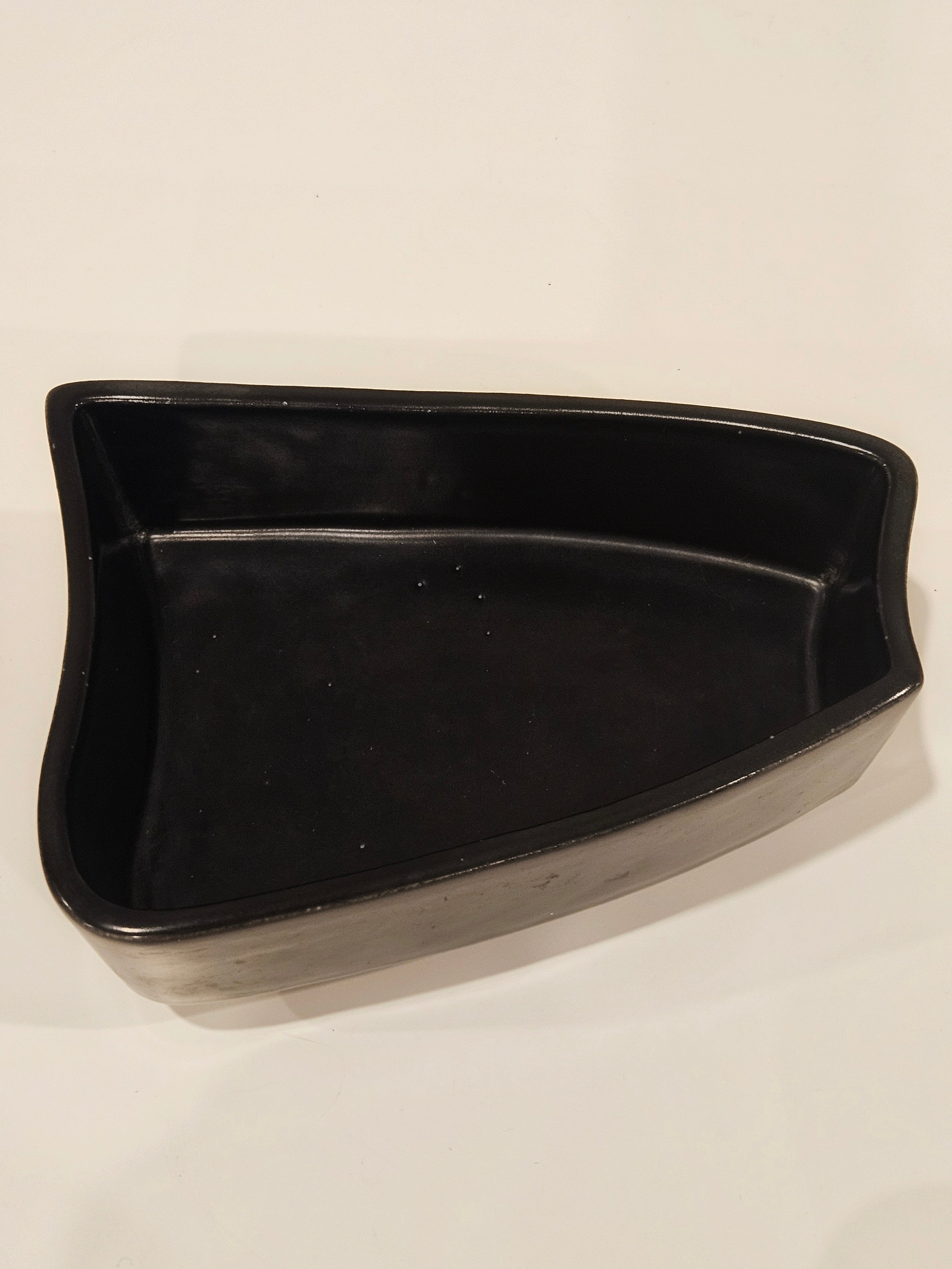 Black ikebana-inspired vase arrangement