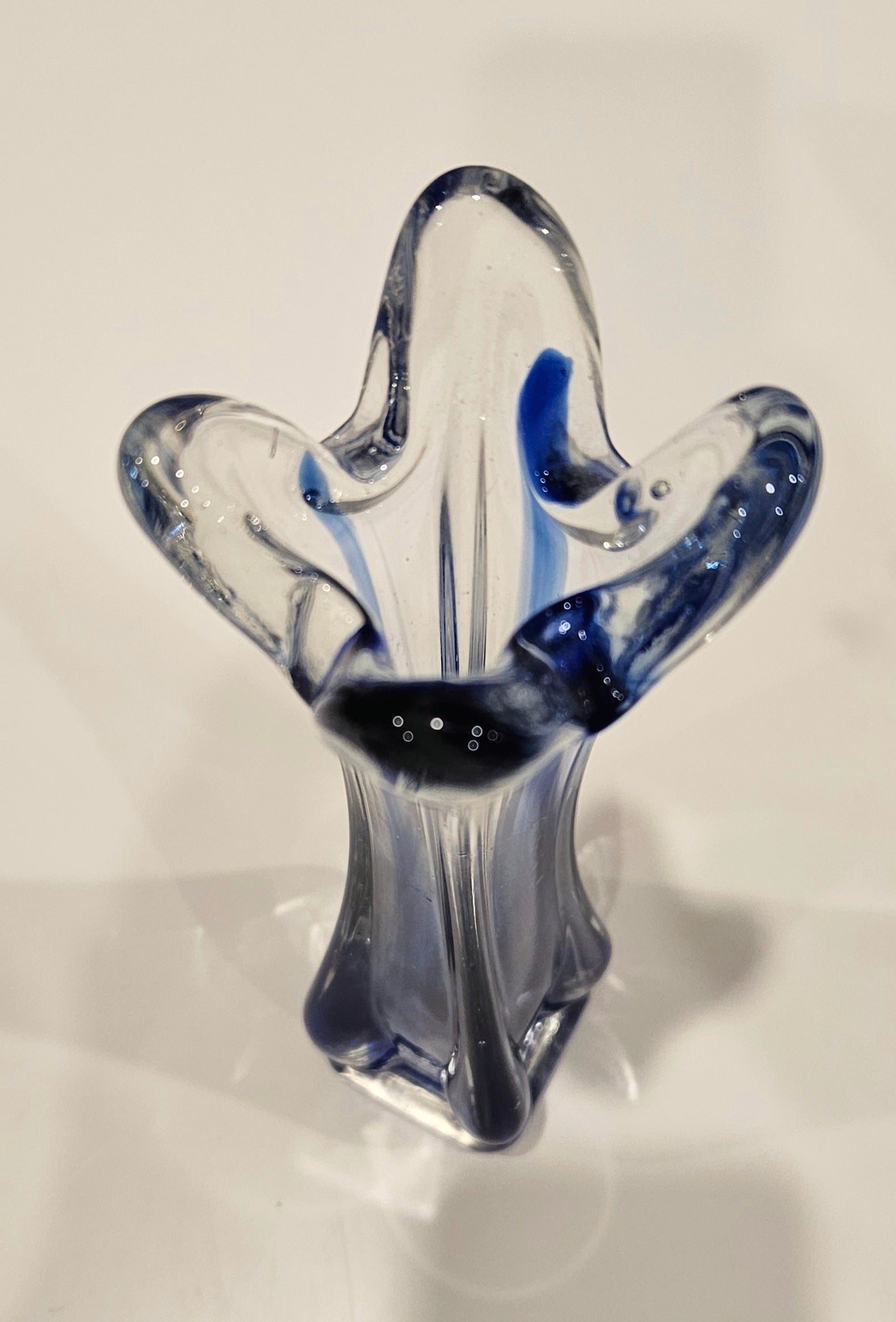 Blue glass finger vase arrangement