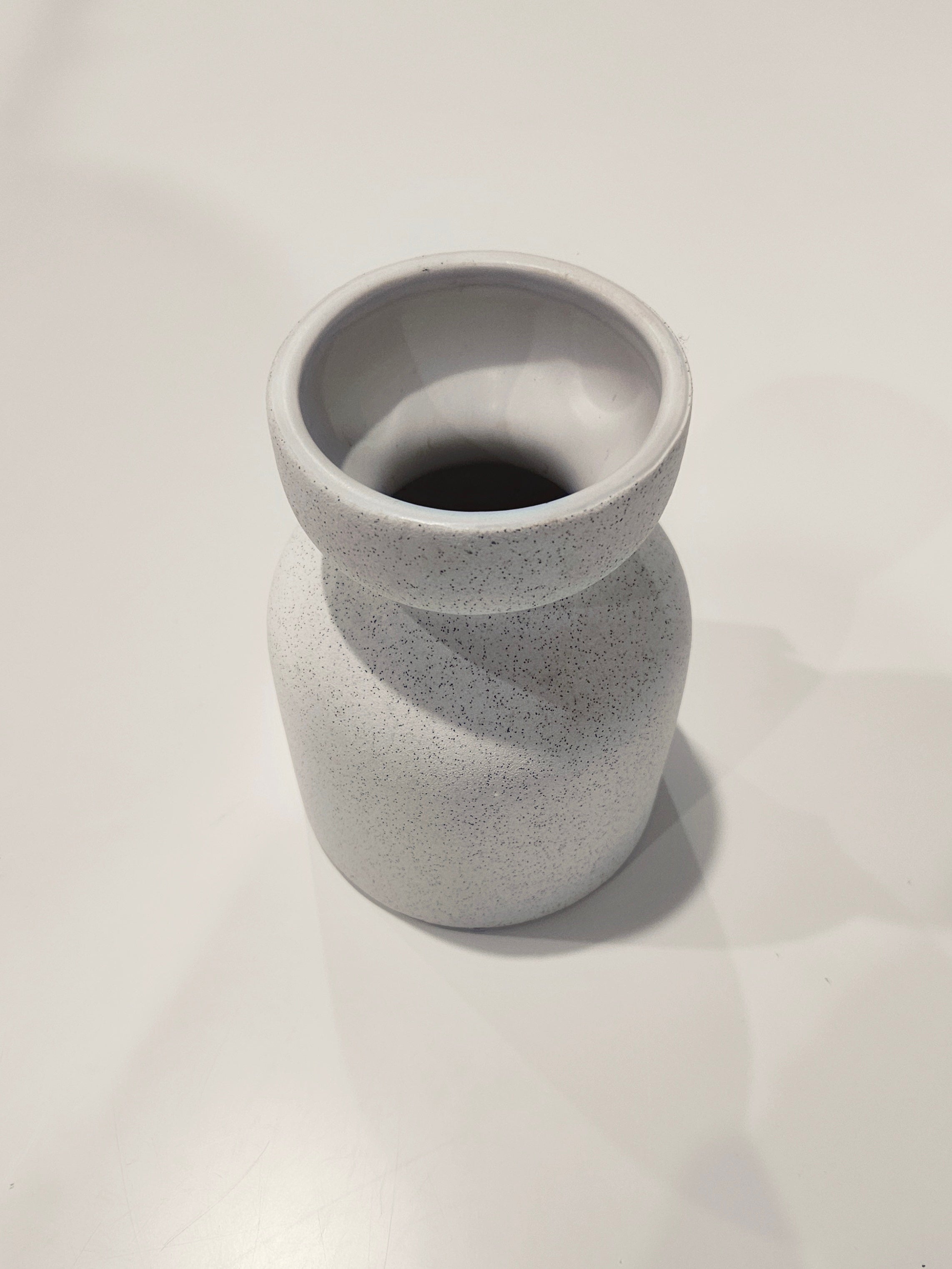 Speckled white vase arrangement