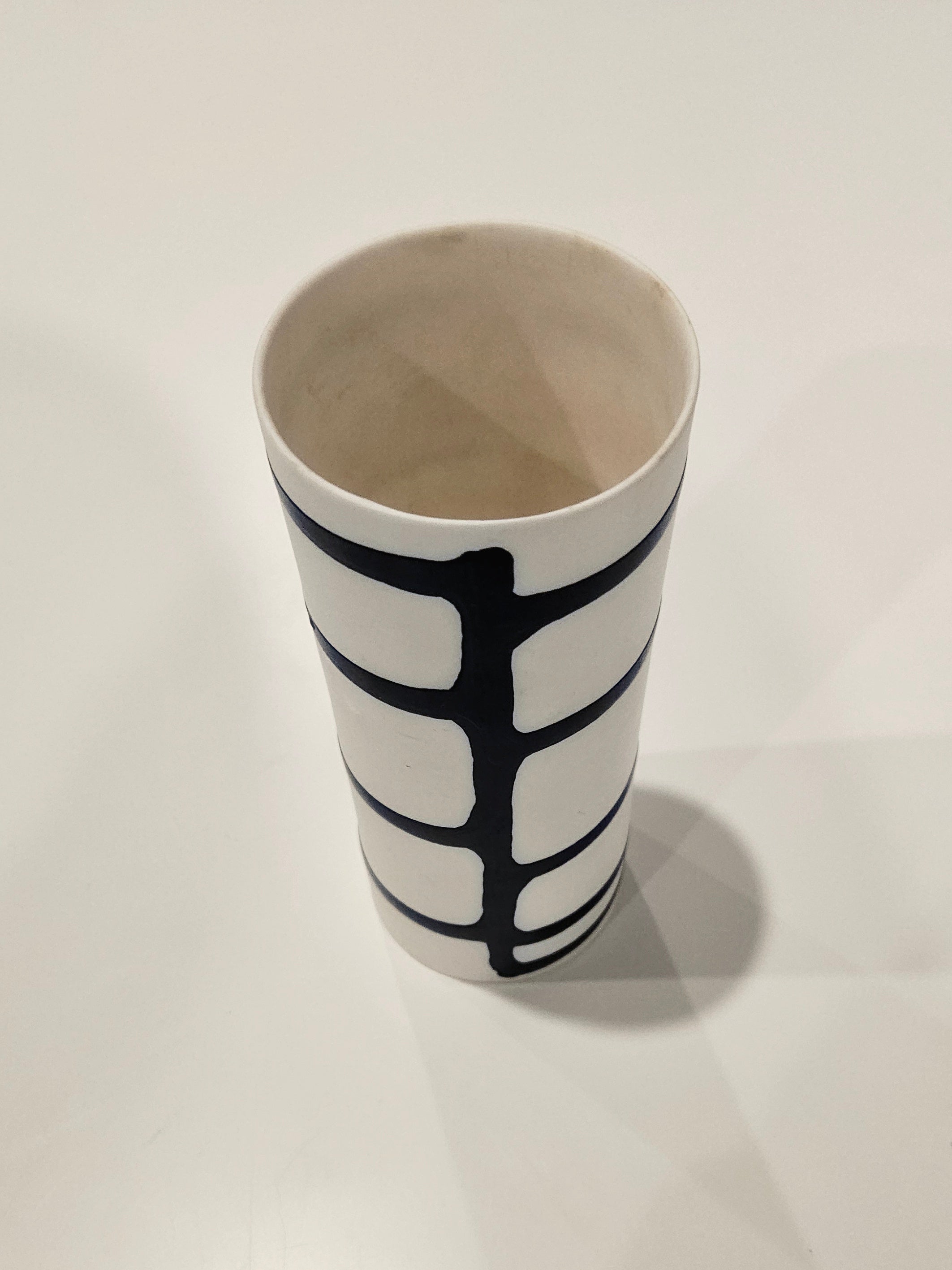 White and blue striped vase arrangement