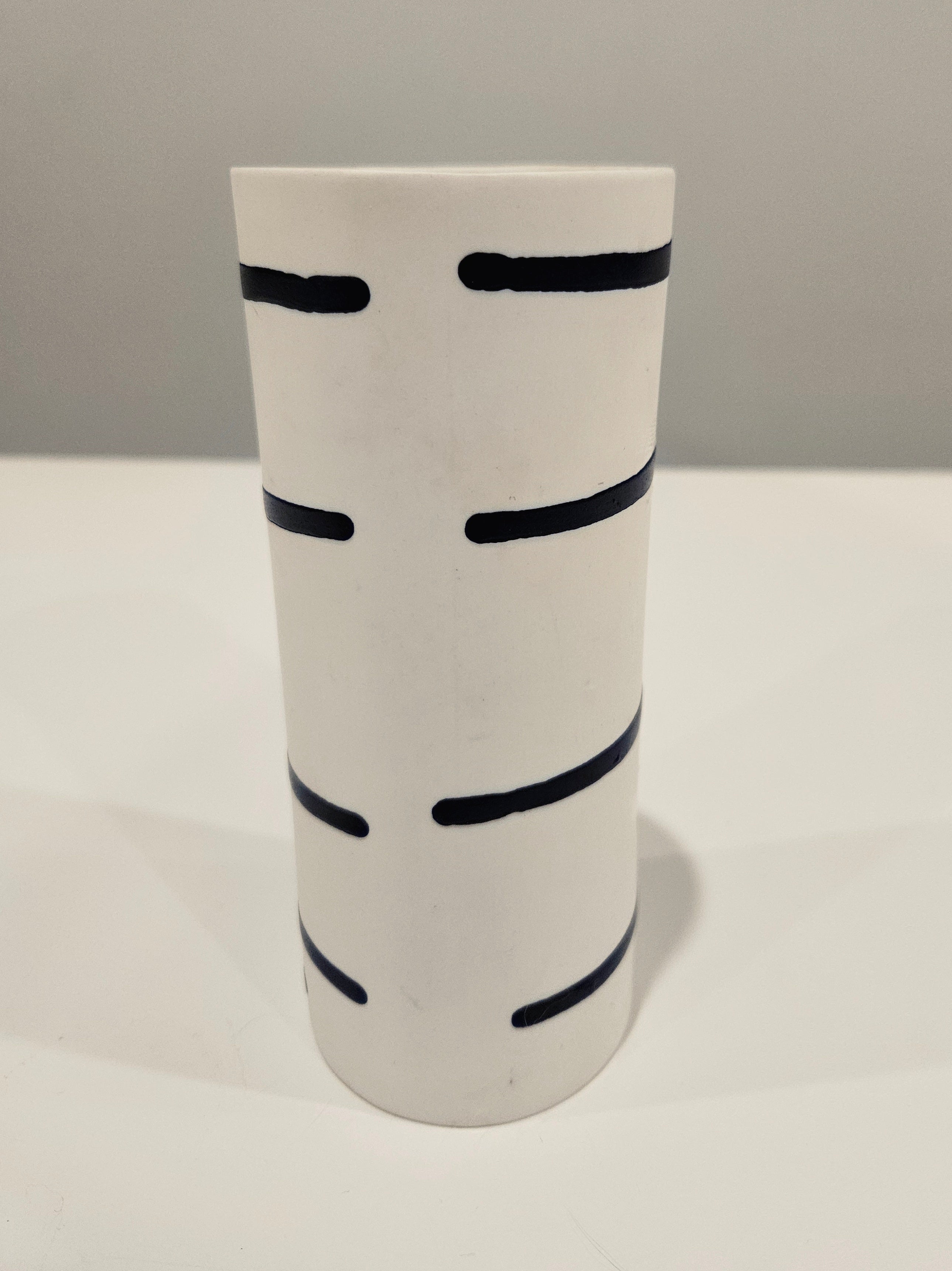 White and blue striped vase arrangement