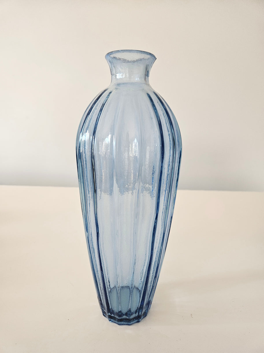 Tall blue edged glass vase