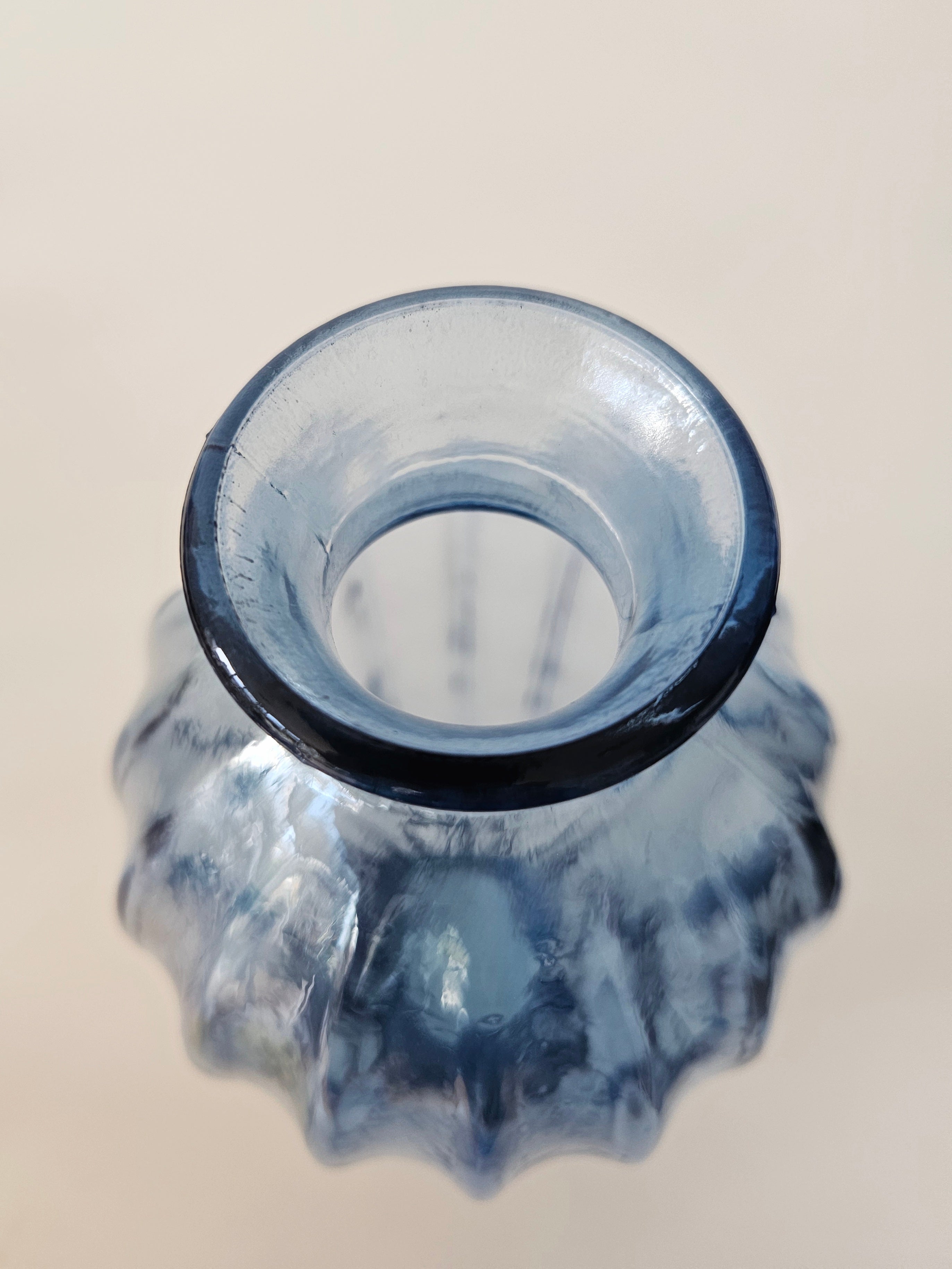 Tall blue edged glass vase