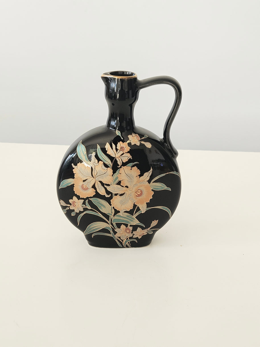 Black and gold Japanese ornamental vase arrangement