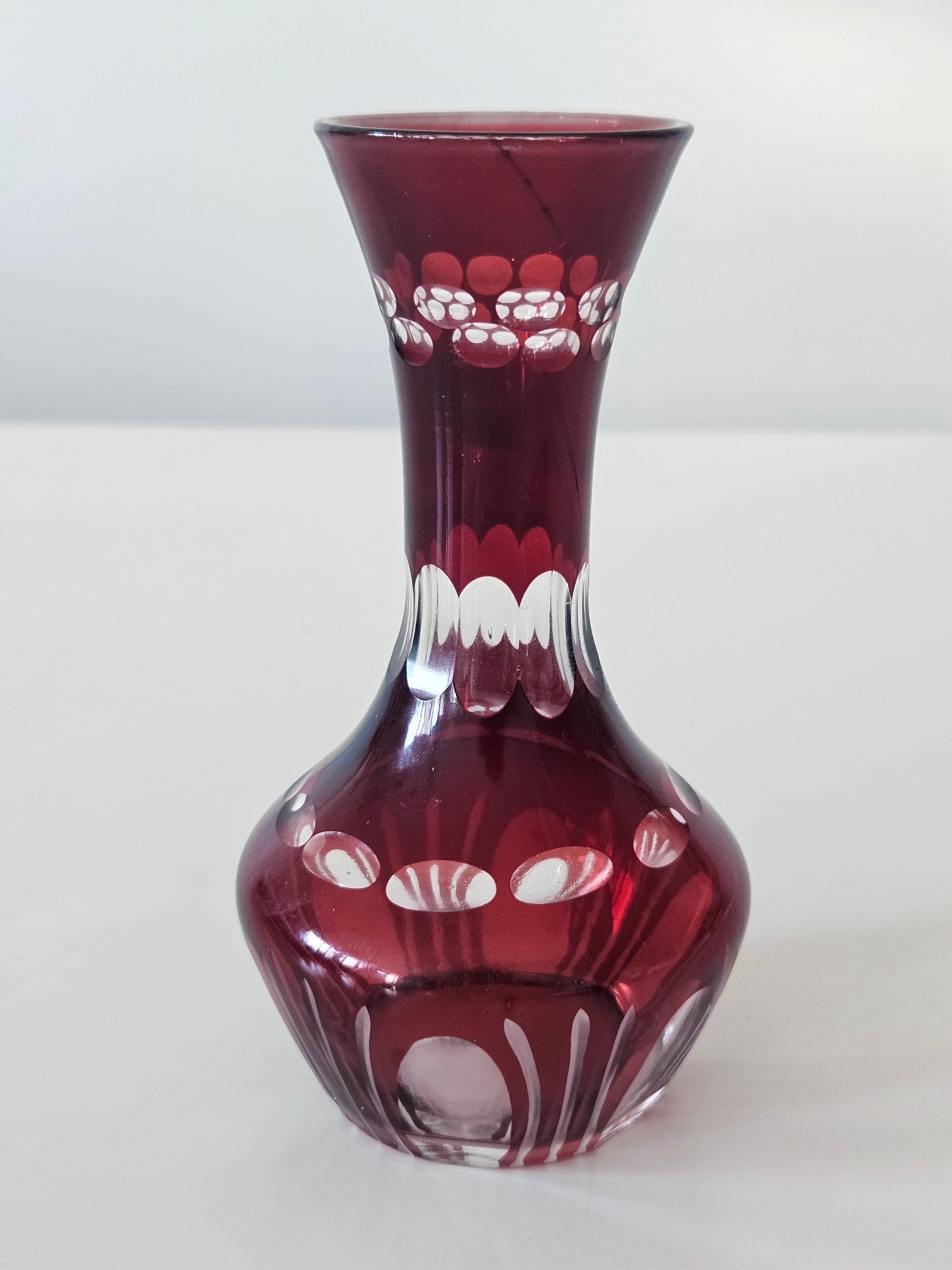 Red abstract bud vase arrangement