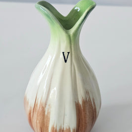 Green and orange bud vase arrangement