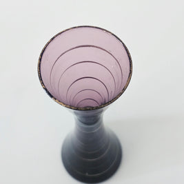 Purple and gold striped bud vase arrangement