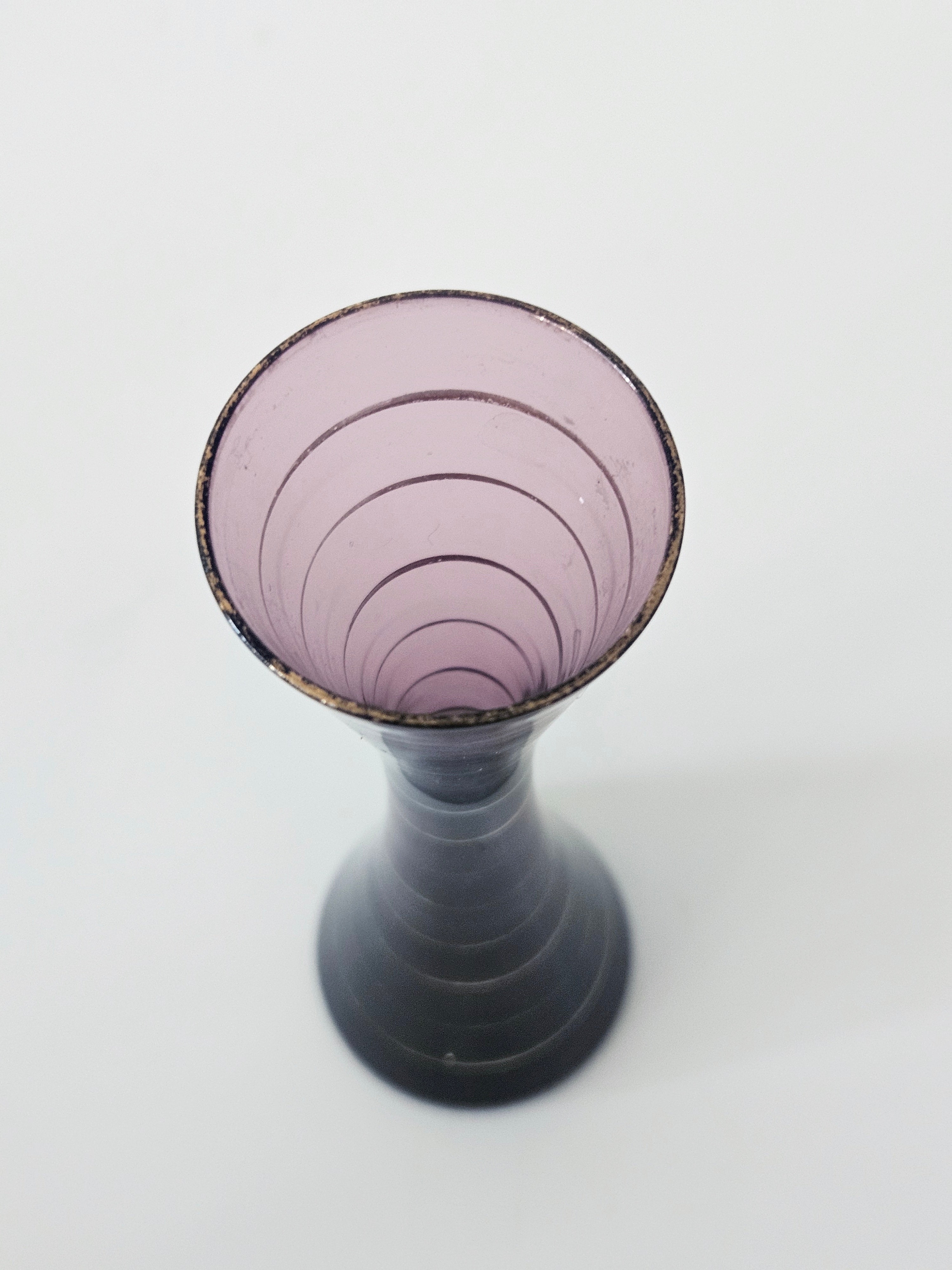 Purple and gold striped bud vase arrangement