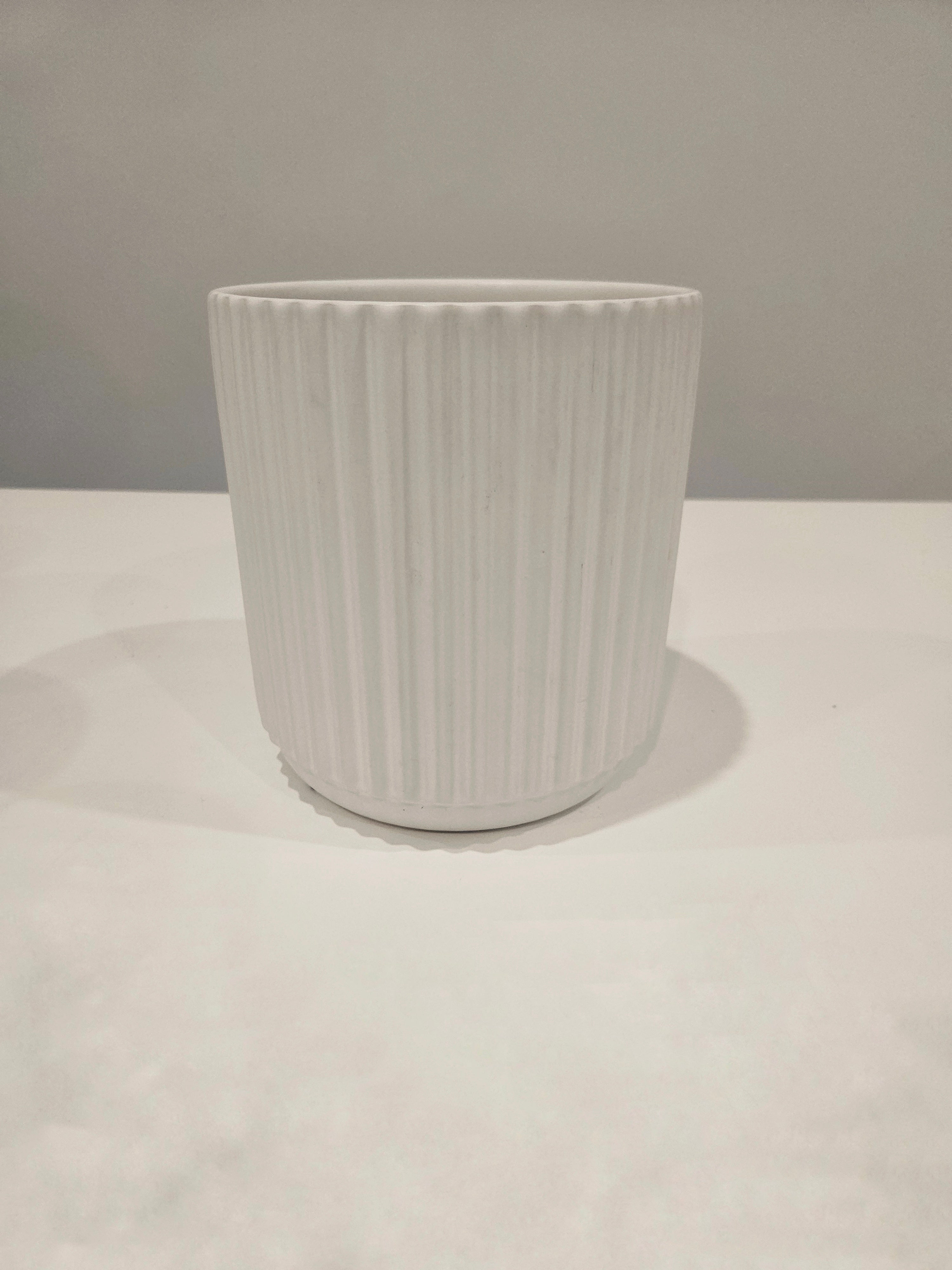 White ribbed pot flower arrangement