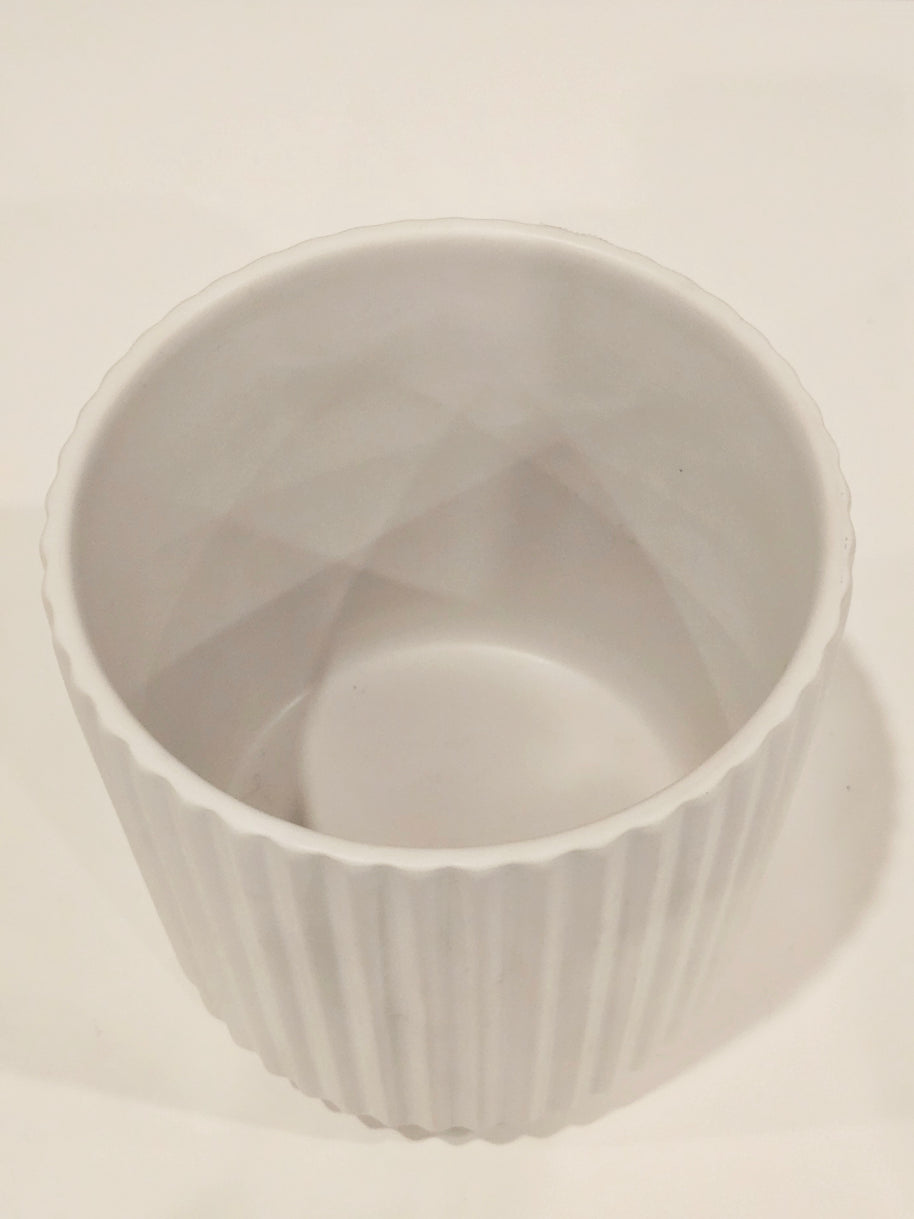 White ribbed pot flower arrangement