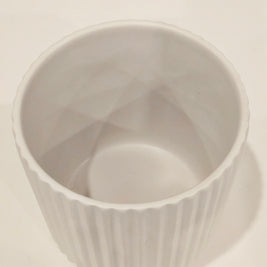 White ribbed pot flower arrangement