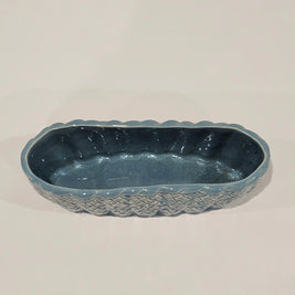 Top down view of a blue ceramic table vase