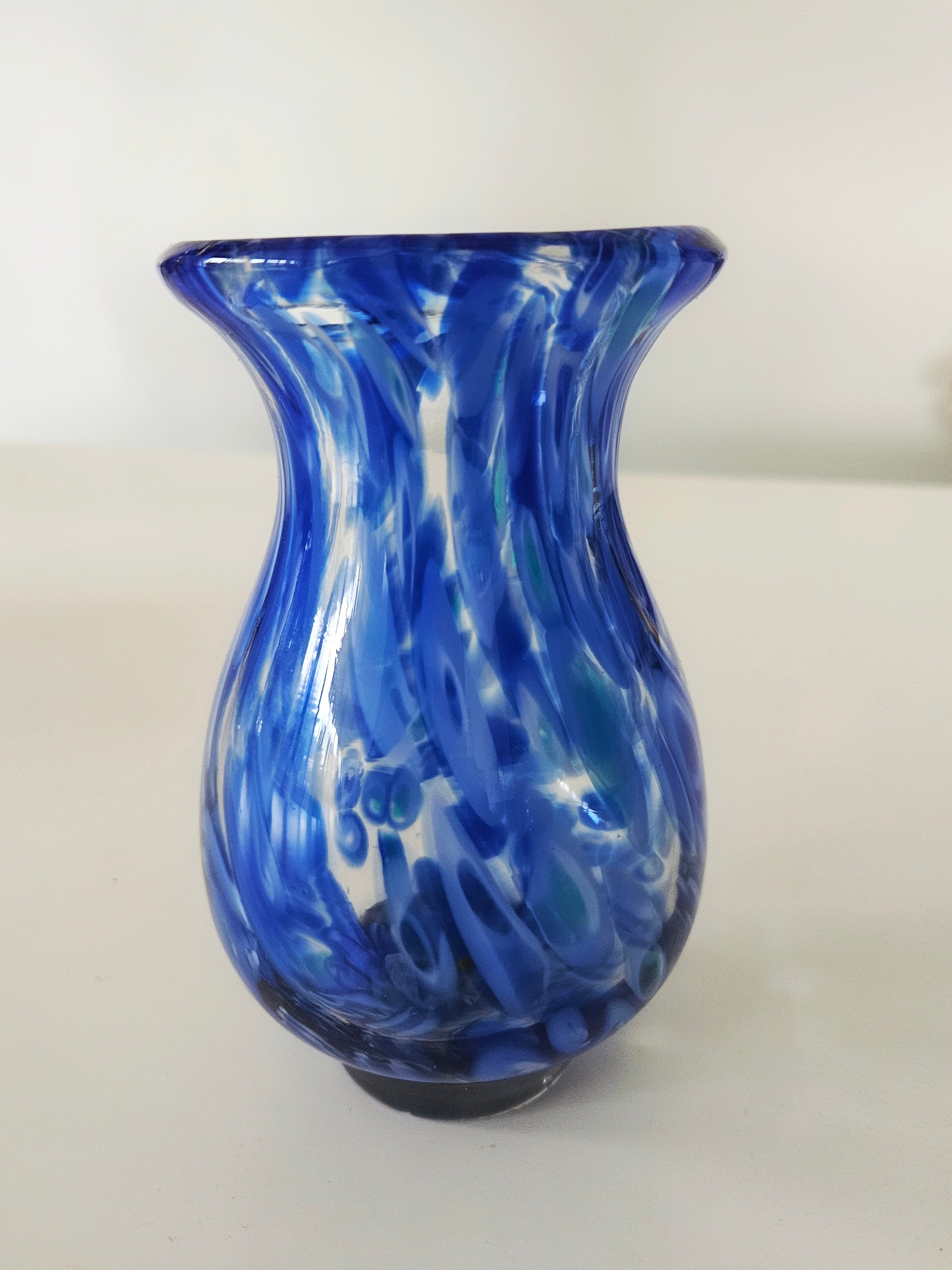 Blue glass vase arrangement