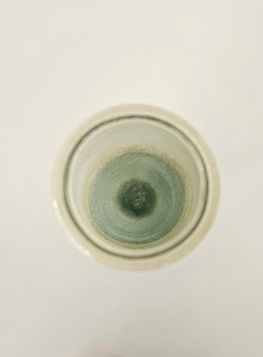 Soft green and white art vase arrangement