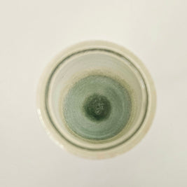 Soft green and white art vase arrangement