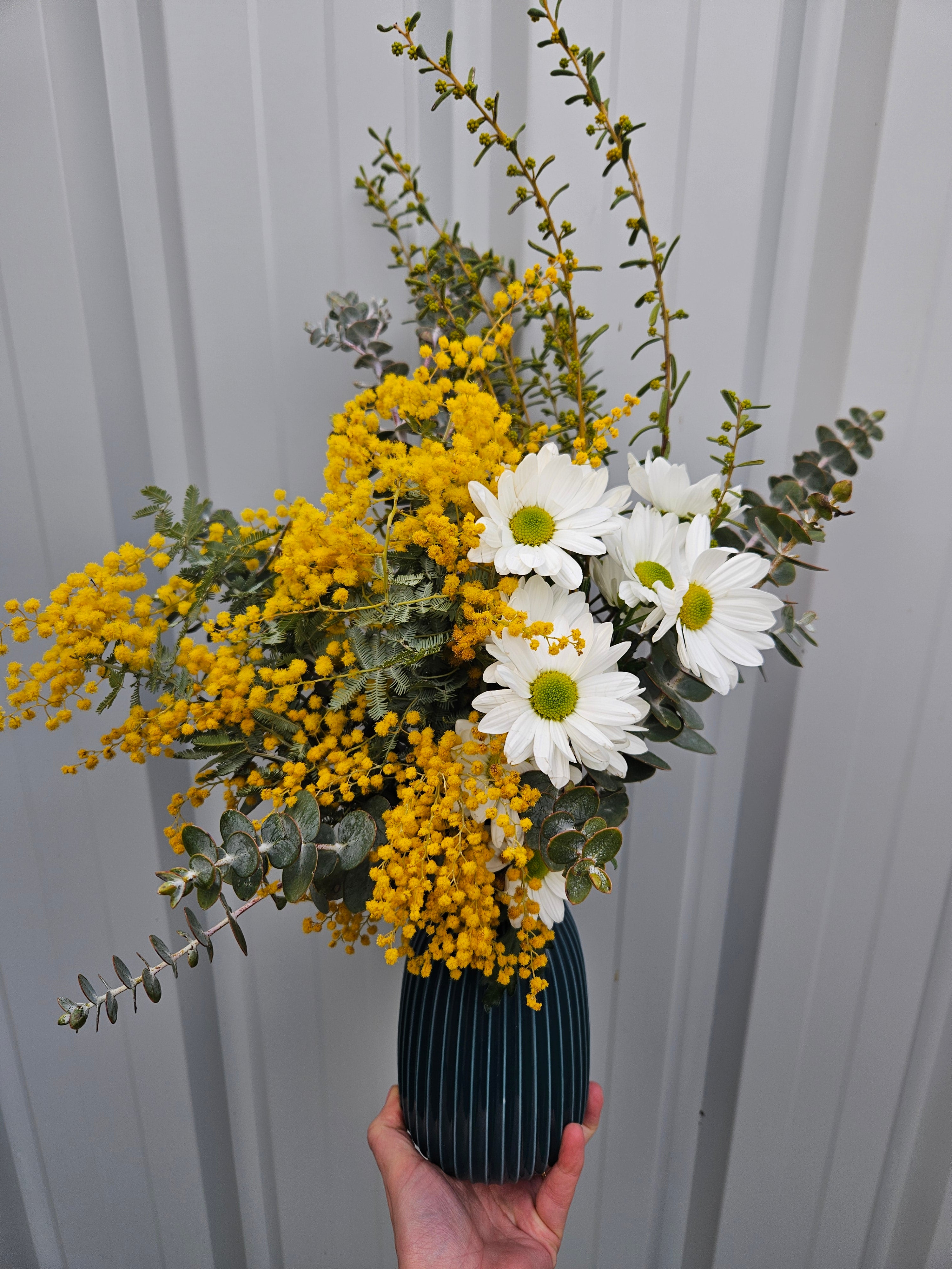 Ceramic blue green vase arrangement