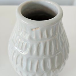 Blue striped ceramic vase arrangement