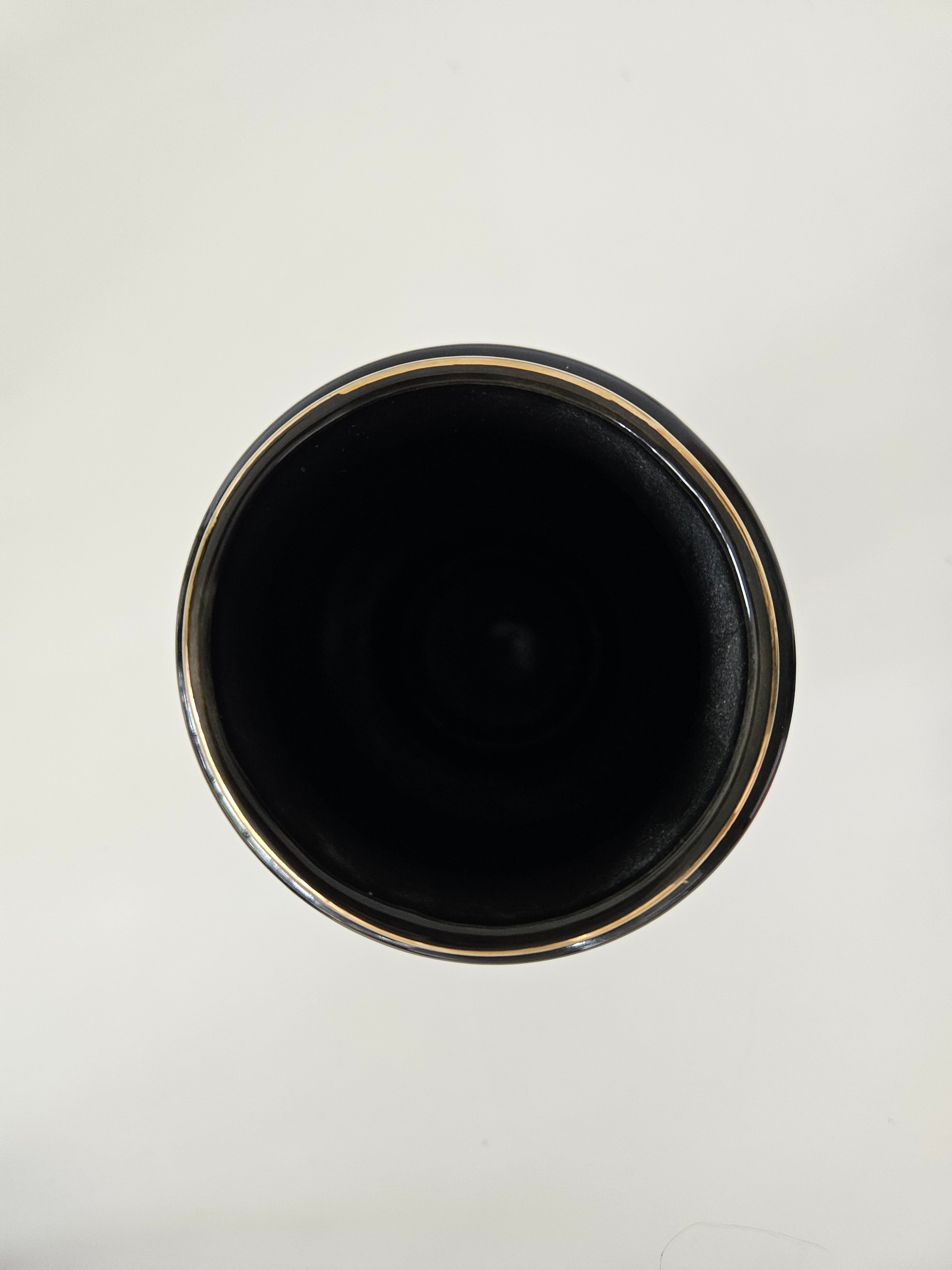 Top down view of a black ceramic vase