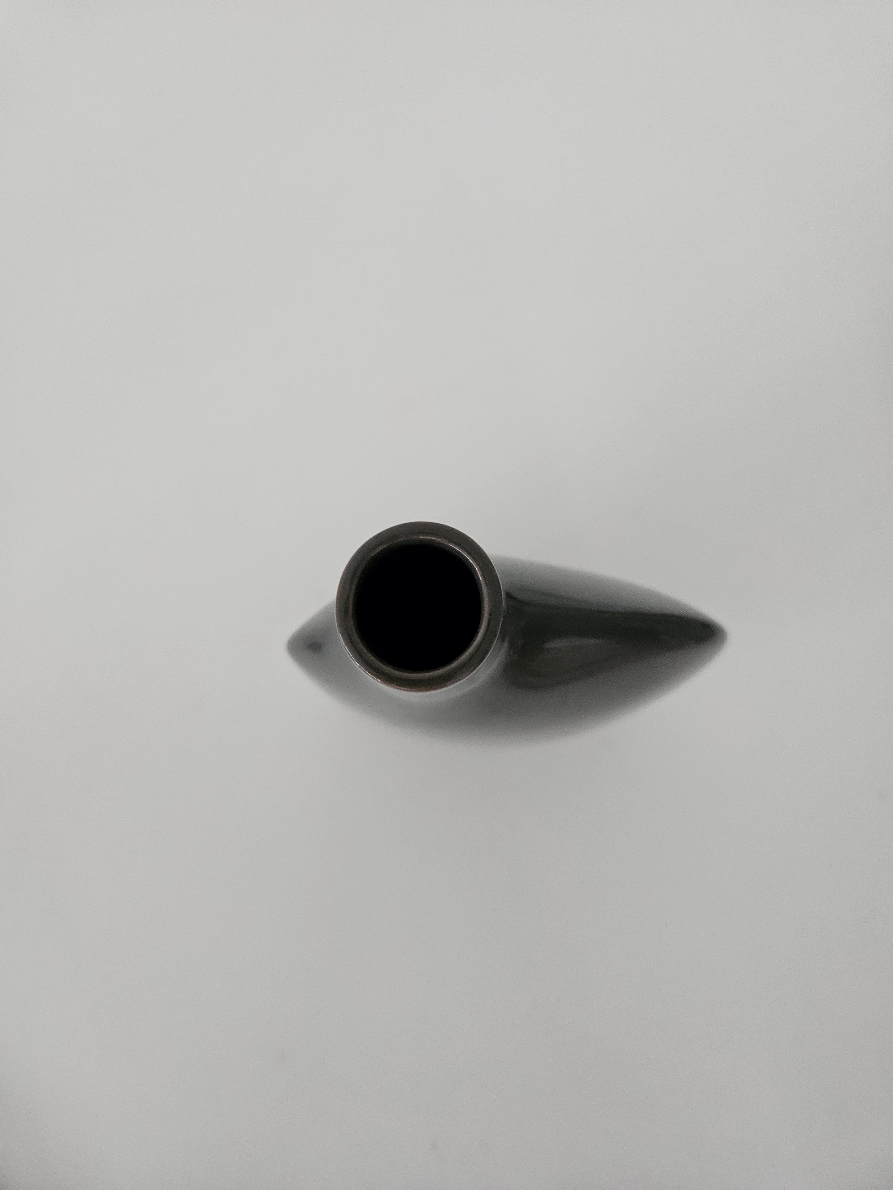 Top down view of a black ceramic vase