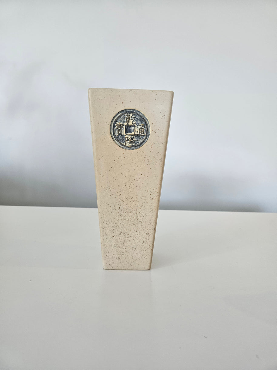 Ceramic stone vase with a Chinese motif on a white background