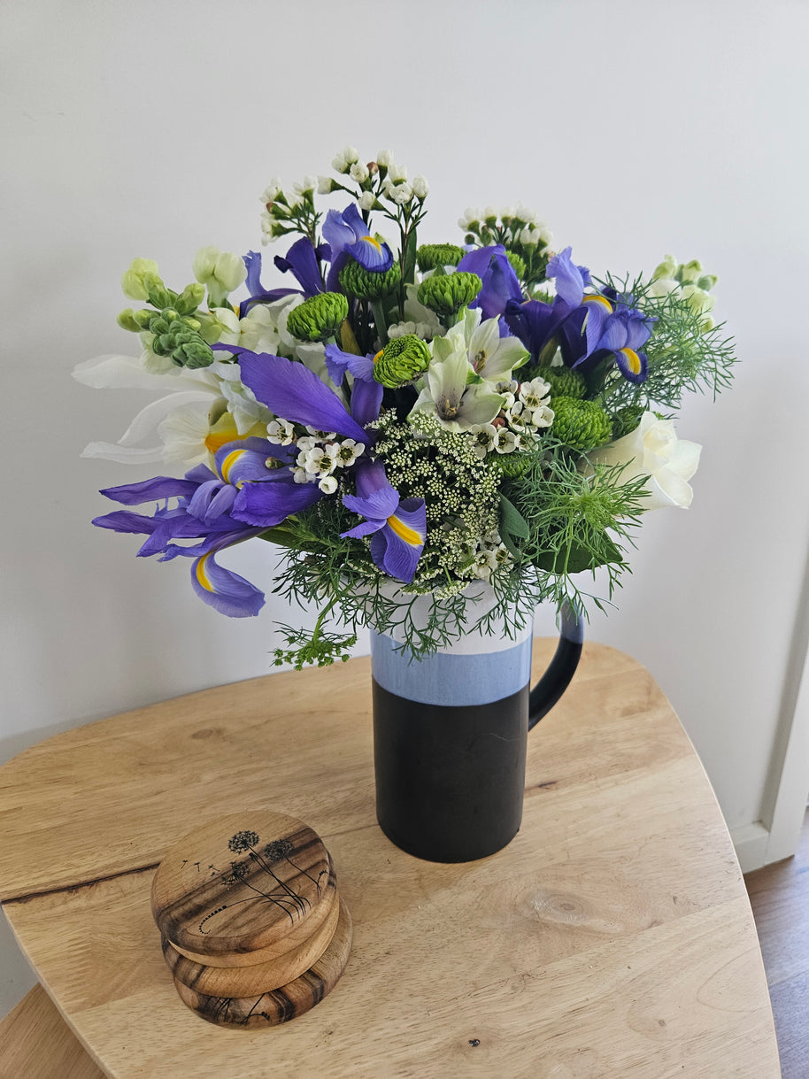 Tall blue striped jug arrangement
