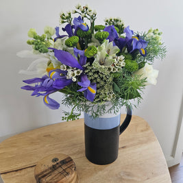 Tall blue striped jug arrangement