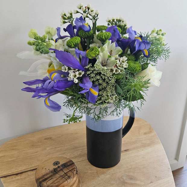 Tall blue striped jug arrangement