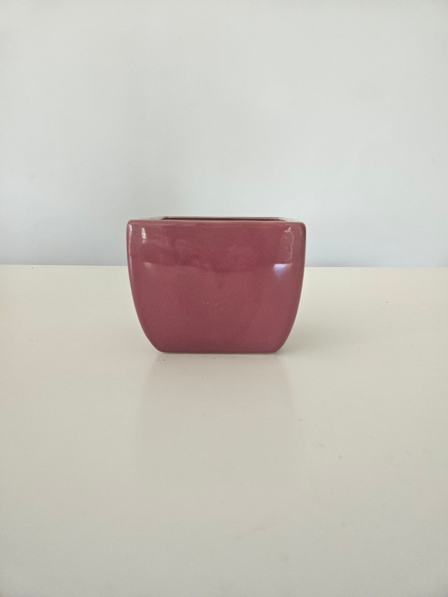 Glossy pink pot flower arrangement