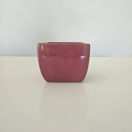 Glossy pink pot flower arrangement