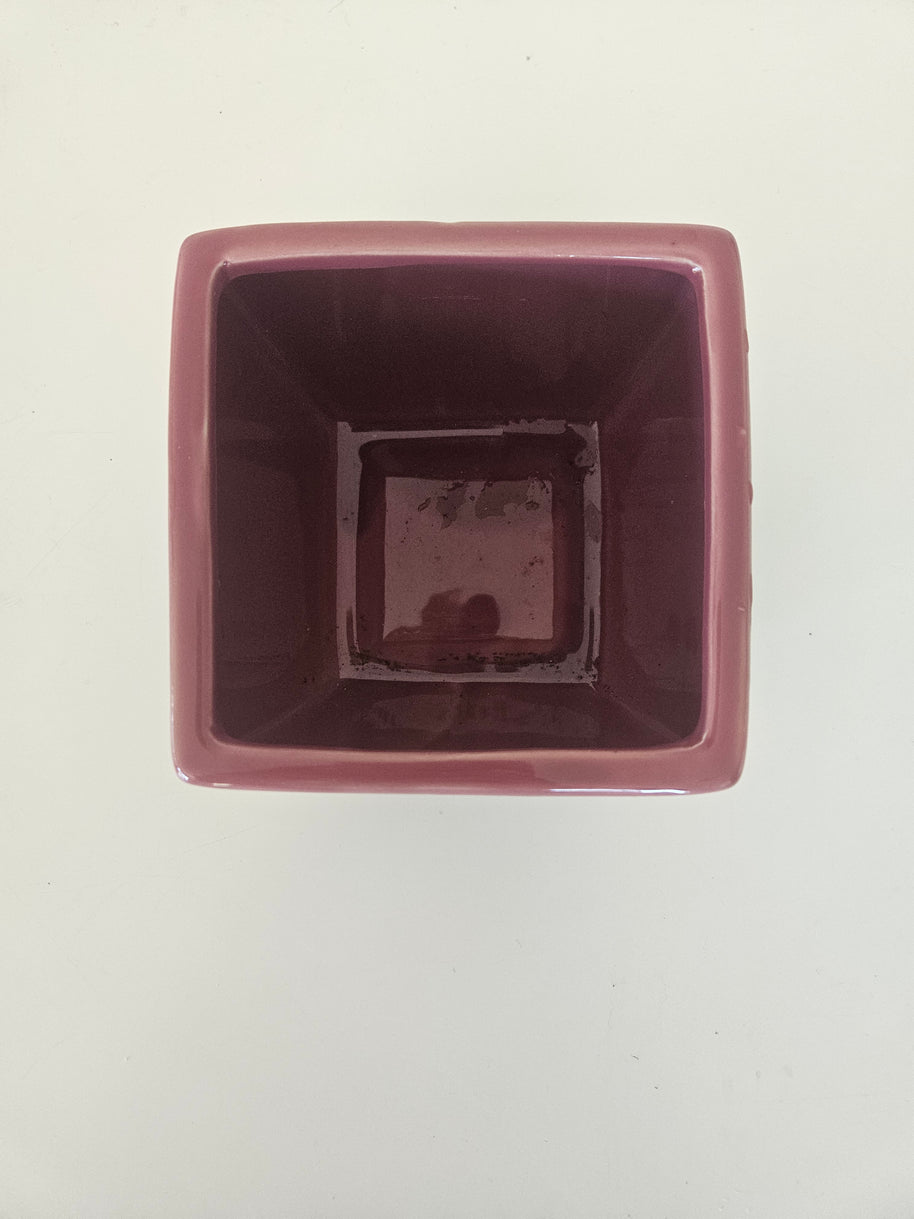 Glossy pink pot flower arrangement