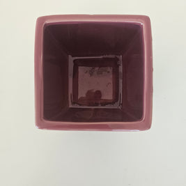 Glossy pink pot flower arrangement