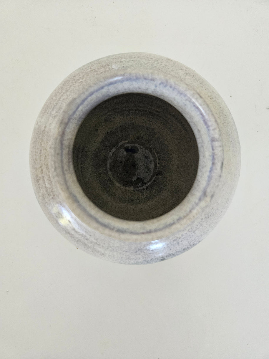 Blue and grey ceramic fishbowl vase arrangement