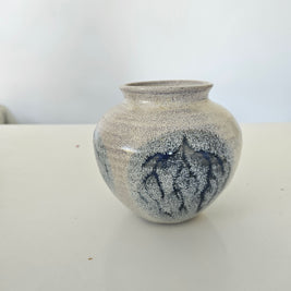 Blue and grey ceramic fishbowl vase arrangement
