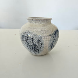 Blue and grey ceramic fishbowl vase arrangement