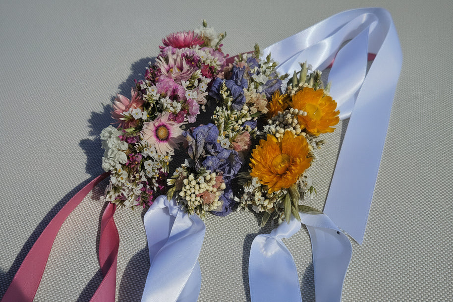 Flower crowns with ribbons on a white background