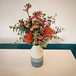 Blue striped ceramic vase arrangement